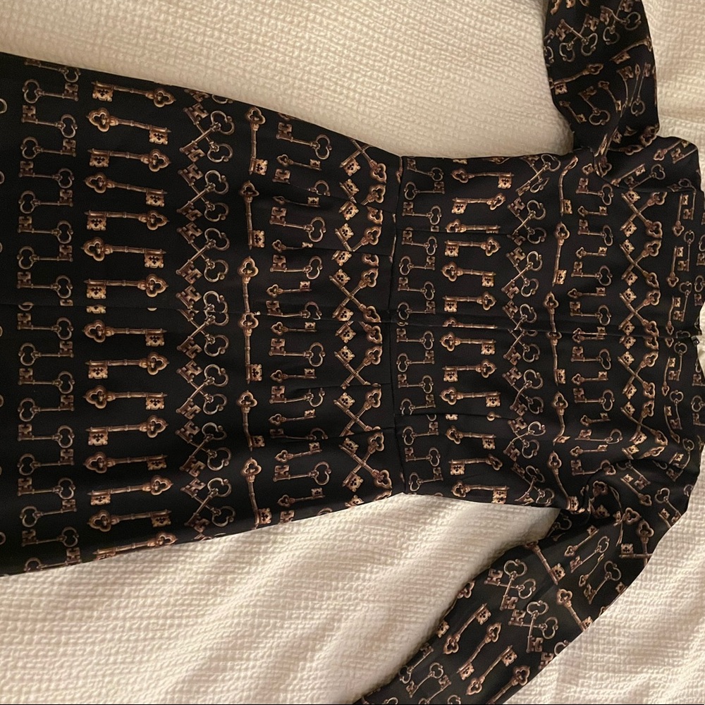 Black and gold dolce and gabbana dress size 10 clean have been only used twice